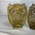 These vintage solid brass owl bookends feature a detailed, openwork filigree design representing wisdom and mid-century...