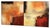 21st Century Custom Made, a two-panel abstract painting featuring a blend of warm colors such as deep red, orange, gold,...