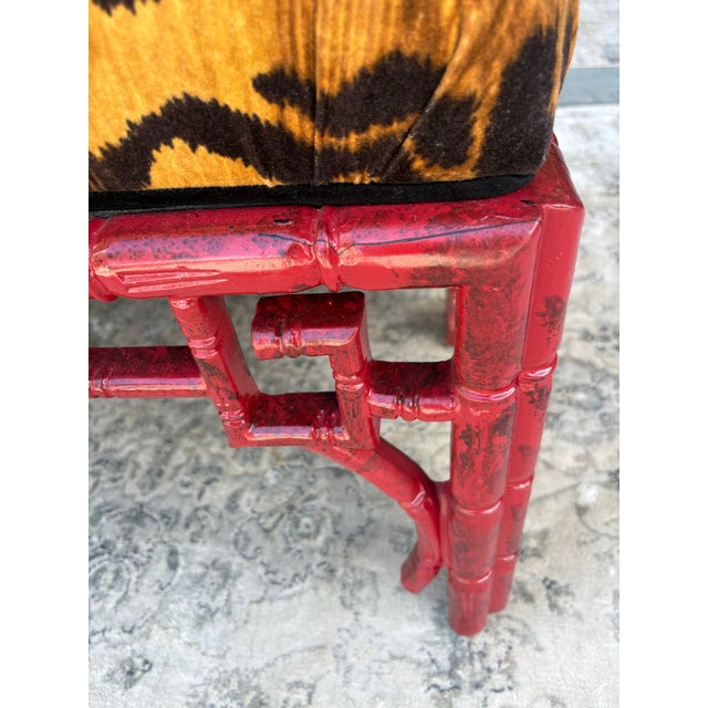 Beautiful antiqued red ottoman with vintage Ballard tiger fabric upholstery. Very sturdy, very firm foam seat area. I love...