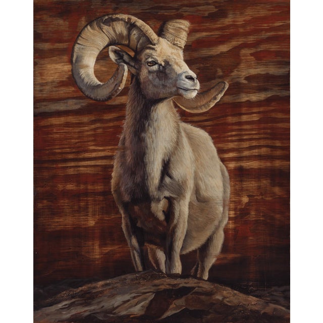 Crowned by the Wild by Terra Novak | Oil on wood of a ram against a wooden background For Sale