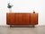 The sideboard was made in the 1970s, Danish production. The structure is covered with teak veneer. The legs are made of...