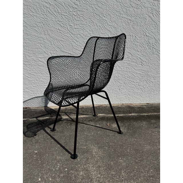 Bring iconic mid-century design to your indoor or outdoor space with this authentic Russell Woodard Sculptura armchair, a...