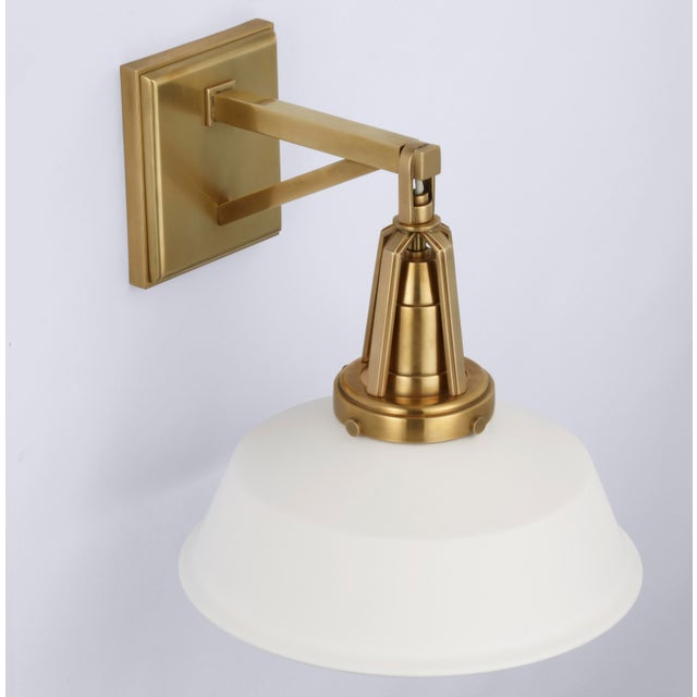 Layton 10" Sconce in Antique-Burnished Brass with Matte White shade Designer: Chapman & Myers Height: 10.25" Extension:...