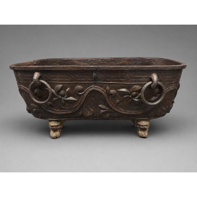 A monumental Chinese cast iron bath tub, also highly decorative as a substantial jardinière or garden planter, likely Qing...