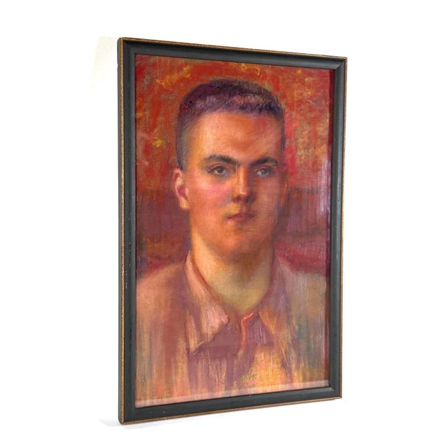 Vintage 1940s or 1950s pastel on paper portrait of a man. Framed in a dark green wooden frame under glass. Unsigned. Has...