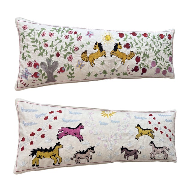 This beautiful 18'' x 54'' hand-embroidered Suzani pillow cover set was made from authentic Uzbek cotton fabric. The...