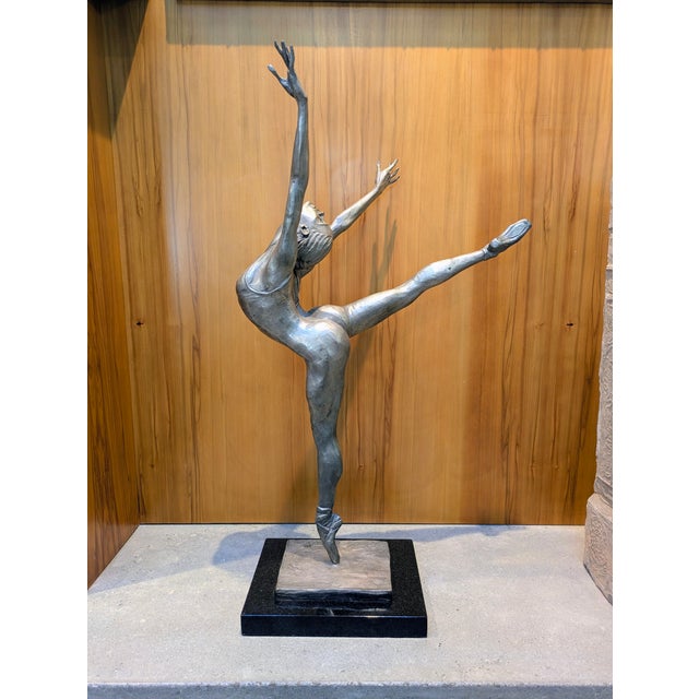 Traveling Man treasures is selling this 2001 limited-edition bronze sculpture titled "Arabesque" (Ballet Dancer) signed by...