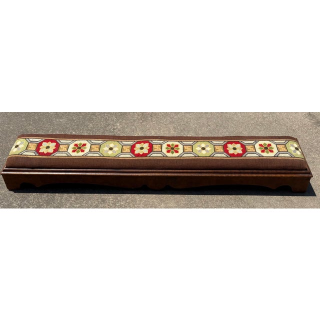 Beautiful antique needlepoint kneeler probably from Europe. Dovetail construction and slanted from front to back 6.” To 5.5”