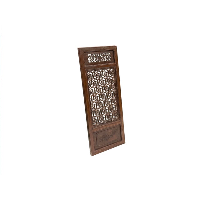 Elevate your interior with this exquisite antique architectural wood panel, a fine example of traditional craftsmanship...