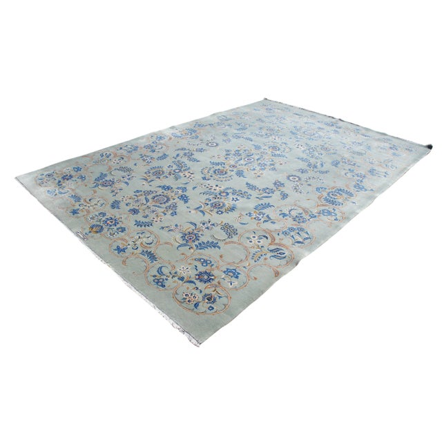 Here we have a beautifully designed floral rug from kashan, Iran. Signed along the edge. This rug is hand knotted with...