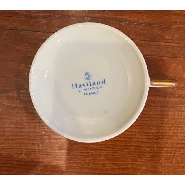 Saucer: 6" x 1" x 6 Cup: 3" x 2 1/2" x 4" Named after its decorator Edouard Dammouse, who created a watercolour for...