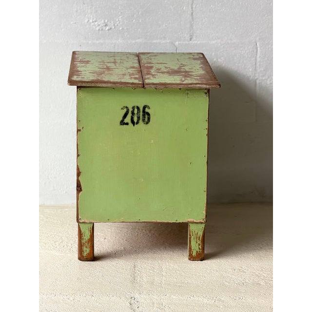 This 50 cm high rustic storage table features a split-lid top that opens to reveal a practical internal compartment,...