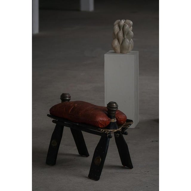 Moroccan Dark Red Upholstered Camel Saddle Ottoman, North Africa, 1940s For Sale - Image 16 of 17
