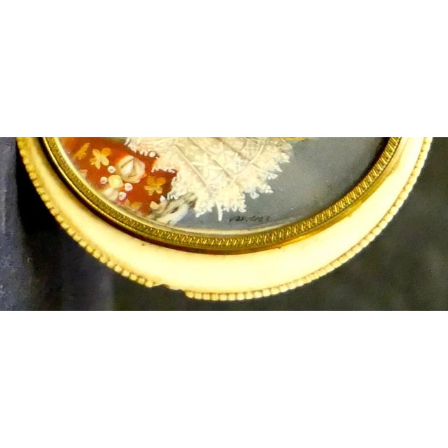 This stunning vintage Continental trinket box is in beautiful hand carved bone with detailed floral accents decorating the...