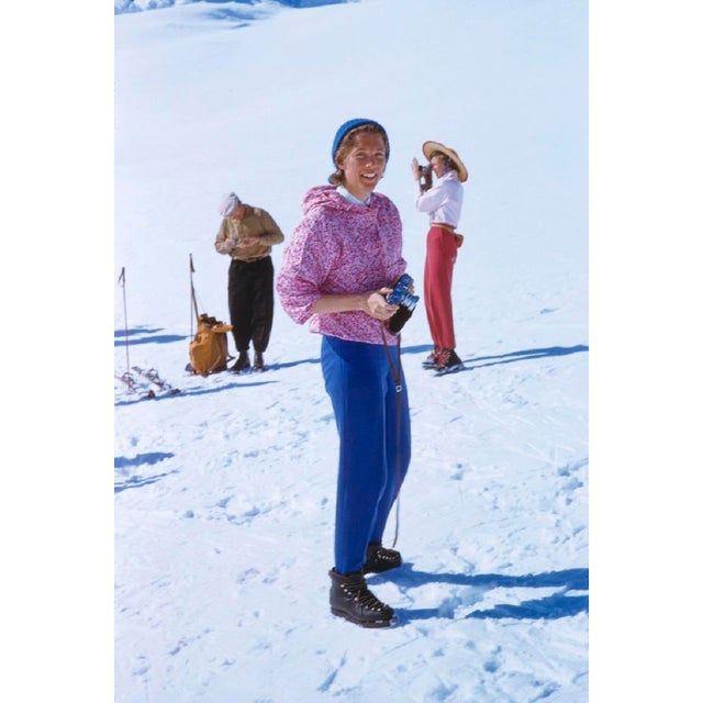 Mountain Photography by Toni Frissell A colourful skier takes photos on the slopes of Zermatt, Switzerland, 1956. (Toni...