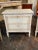 Handsome pair of French Neo-Classical bed side chest with painted Greek Key design. Beautiful patina of a pale grey, gold...