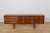 This teak sideboard was manufactured by the renowned British furniture maker Younger Ltd. in the 1960s. It is an excellent...