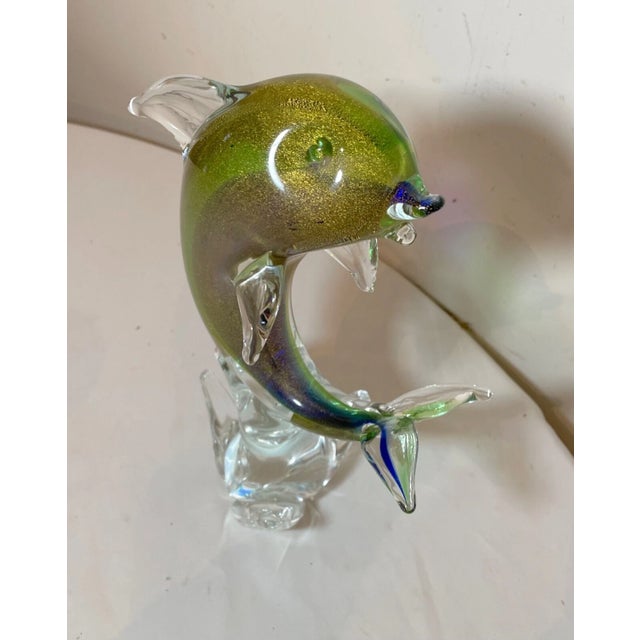 Up for sale is a large vintage hand blown Italian Murano glass dolphin sculpture. It's blown with exquisite detailing...