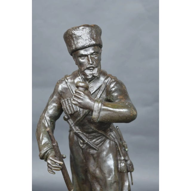 Russian bronze sculpture on a marble base. Signed LAAHCEPE.