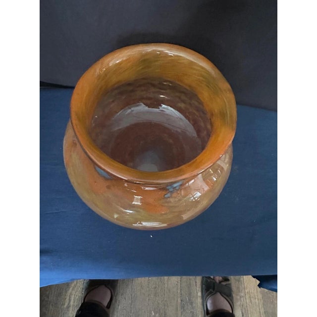 This vintage Art Deco art glass vase was designed by Schneider in the early 1900’s. It features mottled orange/yellow...