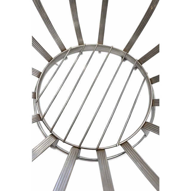 Sleek, sculptural, and effortlessly modern — this stainless steel wire basket is a classic mid-century design. Featuring a...