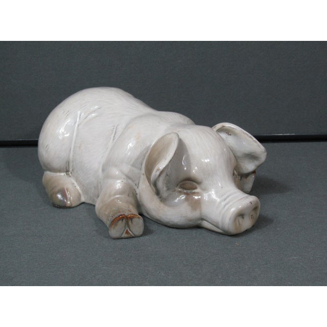A sleepy sculptural pig in soft ivory glaze—instant charm for a shelf, console, or coffee table. I couldn’t pass up this...