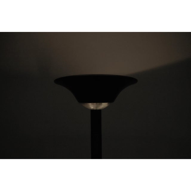 This halogen ceiling chandelier perfectly embodies the 80s and 90s. The slim, simple shape and the slightly blue to...