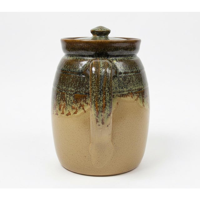 A distinctive vintage North Carolina art pottery lidded coffee pot attributed to the C.C. Cole pottery tradition of the...