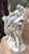 Here we have a porcelain sculpture of a pair of wrestlers with a knife in one hand , originally sculpted by Johan Peter...