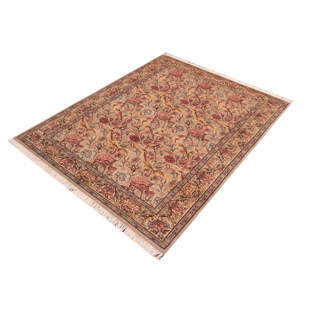 Designed with mesmerizing intricacy and gorgeous color palette, this hand-knotted masterpiece demonstrates the beauty and...
