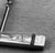 A heavy, well-balanced corkscrew in silver plate over copper, designed by Royal Hickman and marked with three crowns. The...