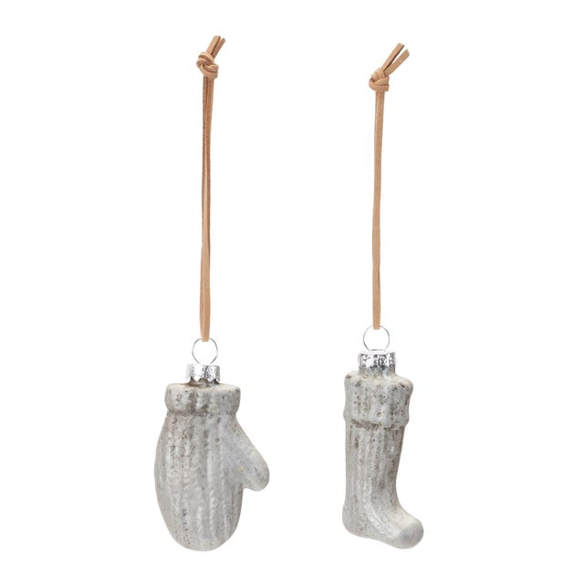 Add timeless charm to your holiday celebrations with this set of Glass Mitten and Stocking Ornaments. Crafted with care,...