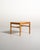 Oak frame with geometric lines, a square top, straight legs, and thin connecting crosspieces. Designed by Sven Engström...