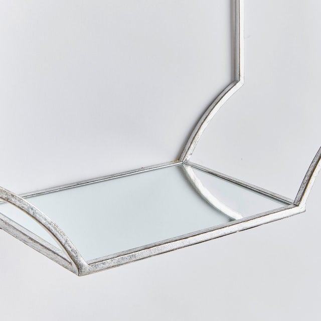 This generouslyscaled and streamlined set of three wall shelves are a lovely design accent. With a mirrored shelf deep...