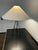 A slim, sculptural tripod table lamp from Lulu and Georgia's Colbeck collection. Iron legs in a black finish add dimension...