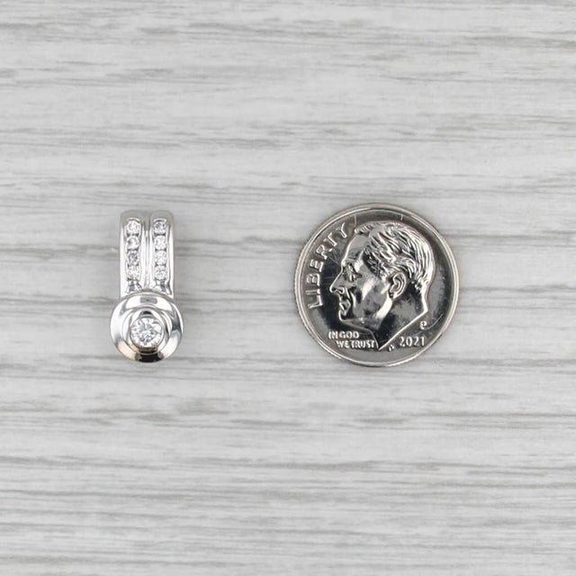 Gemstone Information: - Natural Diamonds - Total Carats - 0.26ctw Cut - Round Brilliant Color - F - H Clarity - SI2 Metal:...