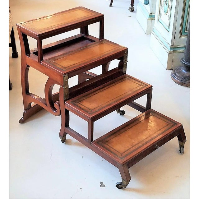 Circa 1815 English Mahogany Metamorphic Folding Library Steps Chair. Metamorphic library steps are a type of dual-use...