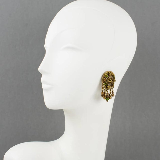 French jewelry artist Henry Perichon (aka Henry) designed these stunning Talosel resin clip-on earrings in the 1960s....