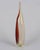 A Kosta Boda "Tobago" art glass vase designed by Kjell Engman. Tall, slender silhouette with slightly oval form and...