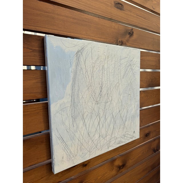 This is a square minimalist abstract painting created with oil paint on canvas. The artwork features a neutral palette of...