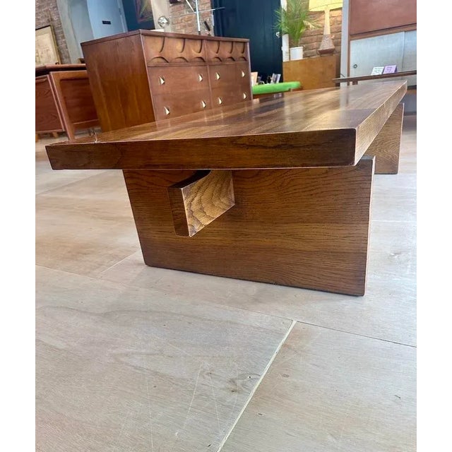 This hefty piece would make a fabulous entryway bench! Nice contrasting wood design on top surface. I believe it is oak...