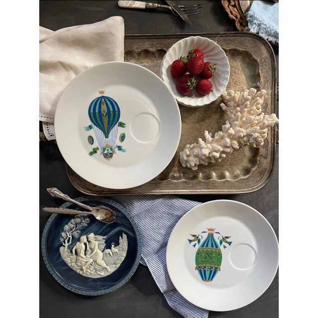 Funky and fun these 1960s plates by George Briard, each have a hot air balloon bowl across the plate, in a bright emerald...