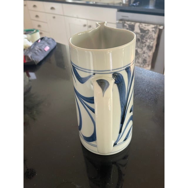 Here is a spectacular folk art blue and white farmhouse pitcher with a very unusual spout shape beak. Love the simple and...