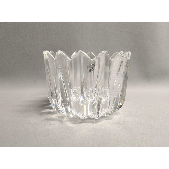 A large Orrefors crystal fleur bowl designed by Jan Johansson. This vintage Swedish art glass bowl is made of heavy...
