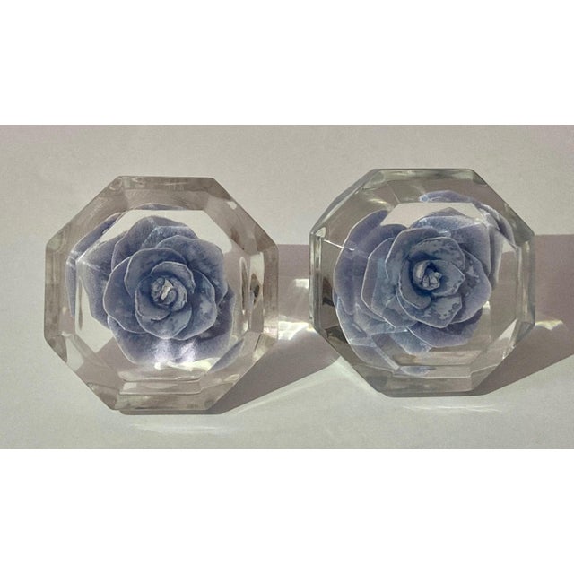 Reverse carved lavender rose incased in clear lucite with set screws. The pair would enhance an armoire when used as door...