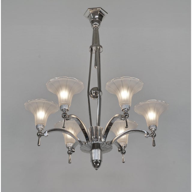 HUBERT PETITOT A large French 1930-35 art deco chandelier in nickel plated solid brass or bronze by the famous Paris based...