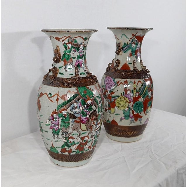 Pair of Nankin Chinese porcelain porcelain vessels with beige cracked background with polychrome enamelled decor. Each...