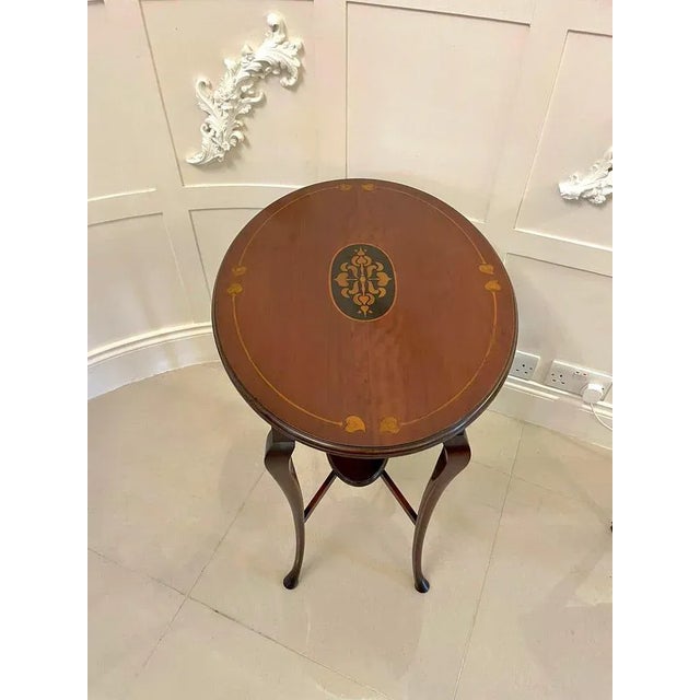 Quality antique art nouveau inlaid mahogany oval lamp table having a quality inlaid mahogany art nouveau oval top and...