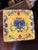 Enhance your dining experience with the Maxcera Yellow Talavera Square Plate, a stunning piece of hand-painted ceramic...