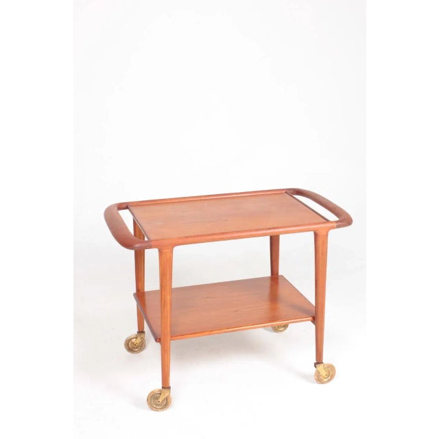 Trolley in teak, designed by Maa. N.O. Møller. Great original condition. I have official proof of authenticity such as...